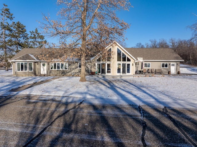 view of snow covered house