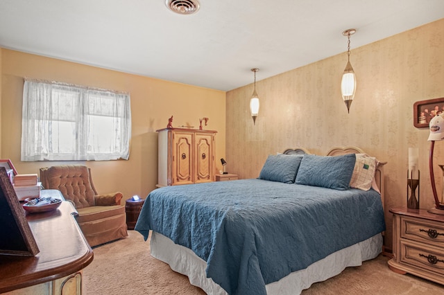 bedroom featuring light colored carpet