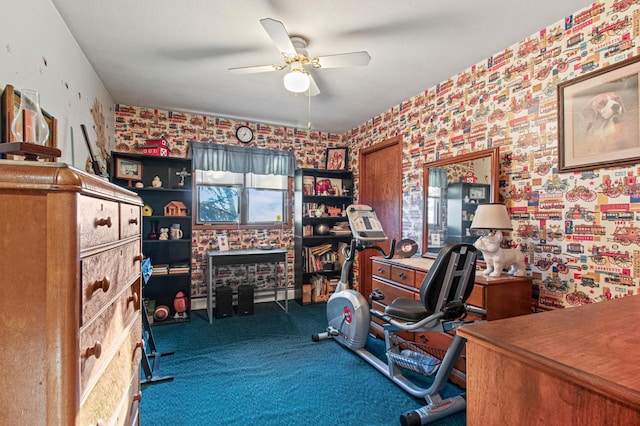 home office featuring carpet and ceiling fan