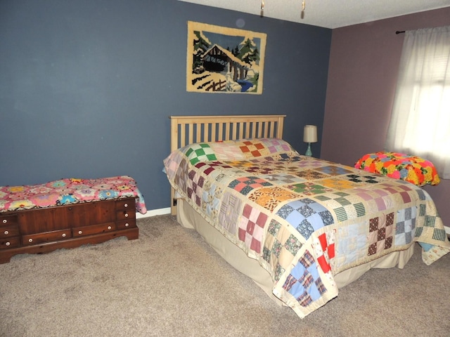 bedroom featuring carpet