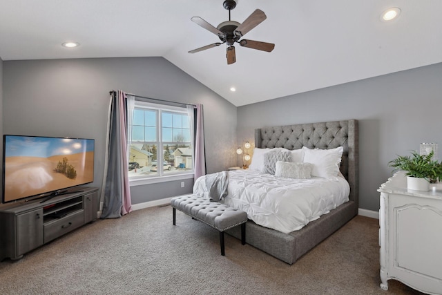 carpeted bedroom featuring lofted ceiling and ceiling fan