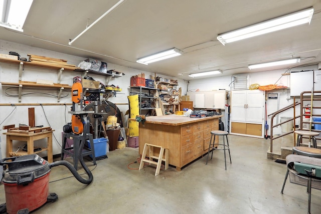 basement featuring a workshop area