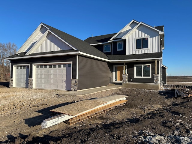 craftsman-style home featuring a garage