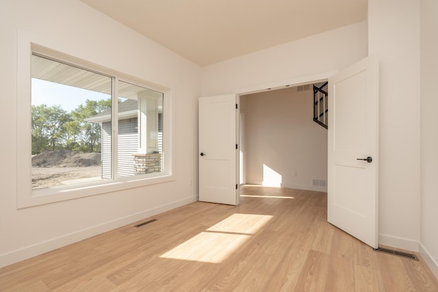 25341 Delmar Ave, New Prague, MN 56071 - empty room featuring light wood-type flooring and baseboards