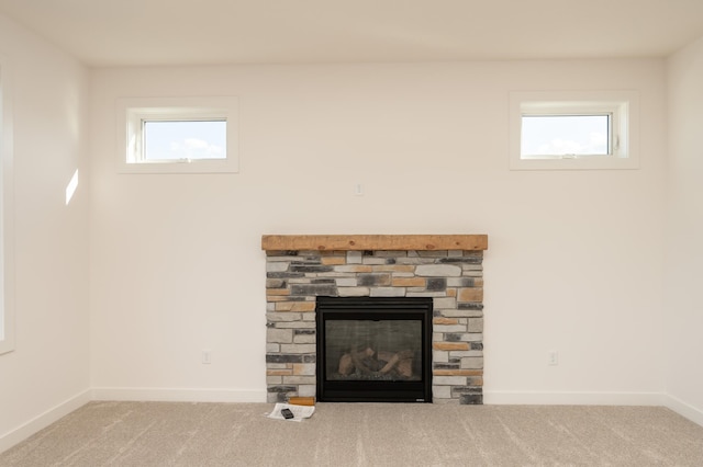 25341 Delmar Ave, New Prague, MN 56071 - detailed view of a fireplace, carpet, and baseboards