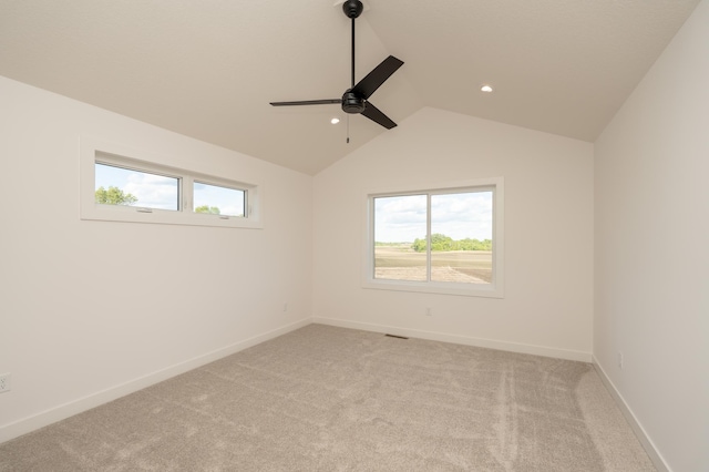 25341 Delmar Ave, New Prague, MN 56071 - empty room with a ceiling fan, healthy amount of natural light, light colored carpet, lofted ceiling, and recessed lighting