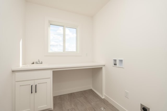 25341 Delmar Ave, New Prague, MN 56071 - washroom with hookup for a washing machine, hookup for an electric dryer, cabinet space, and baseboards