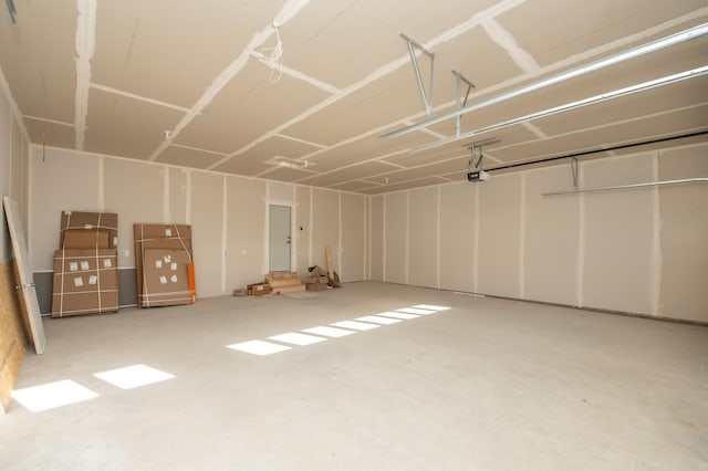 25341 Delmar Ave, New Prague, MN 56071 - garage featuring a garage door opener