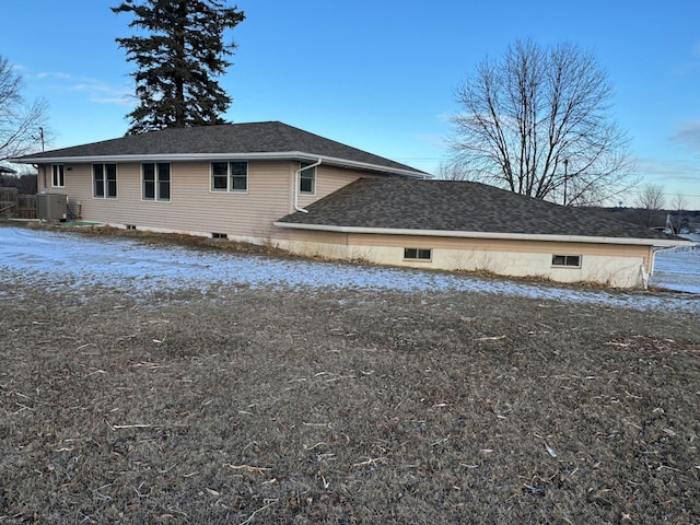 view of side of home with cooling unit