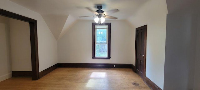 bonus room featuring ceiling fan, light hardwood / wood-style floors, and lofted ceiling