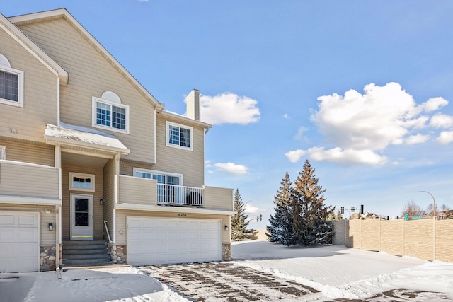 view of front of property featuring a garage