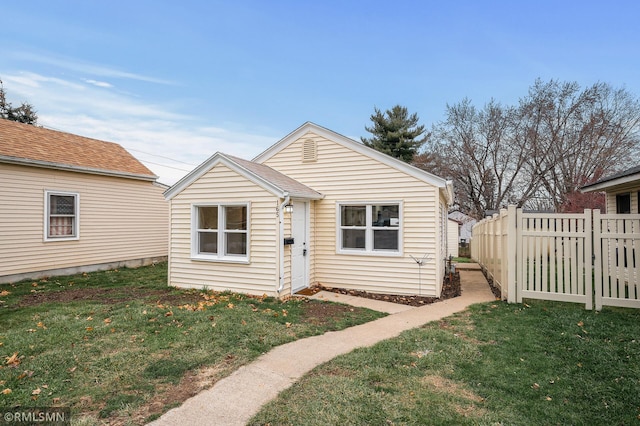 view of front of home with a front yard