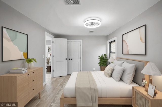 bedroom featuring light wood-type flooring