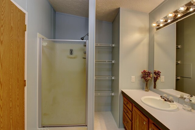 15331 129th Ave, Wadena, MN 56482 - full bath with a shower stall, vanity, and a textured ceiling