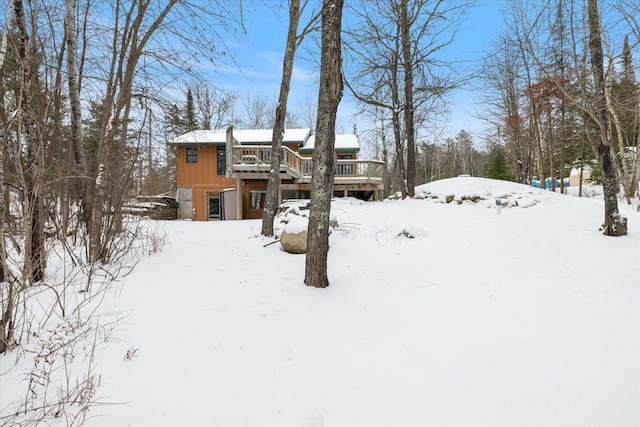 exterior space featuring a wooden deck