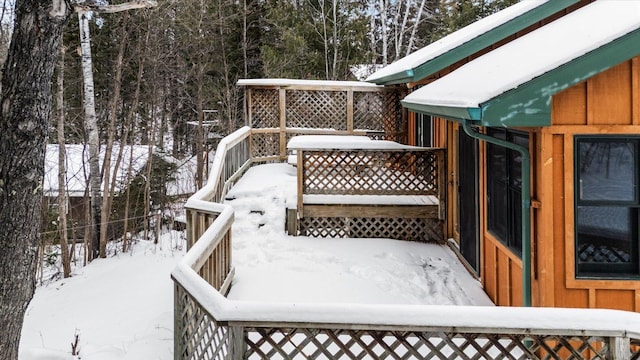 view of snow covered deck