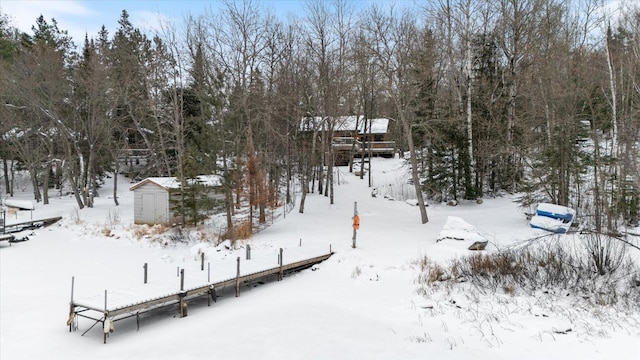 view of yard covered in snow