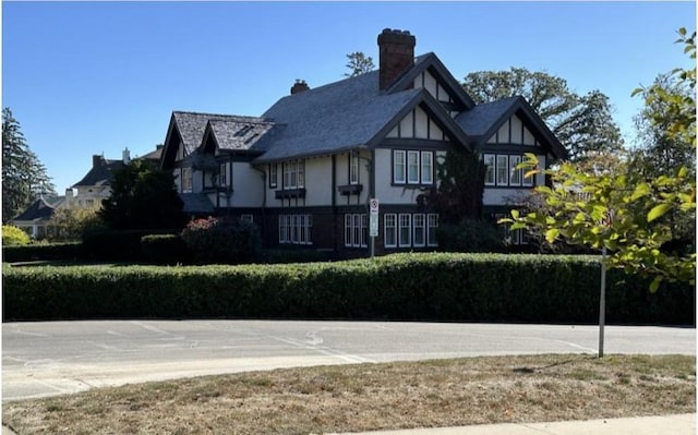 view of front of home with a chimney