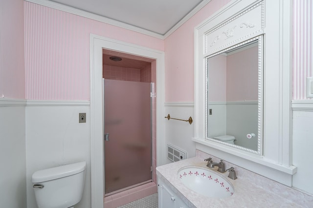 full bath with a shower stall, toilet, and vanity