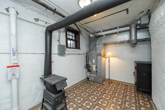 below grade area with tile patterned floors and heating unit