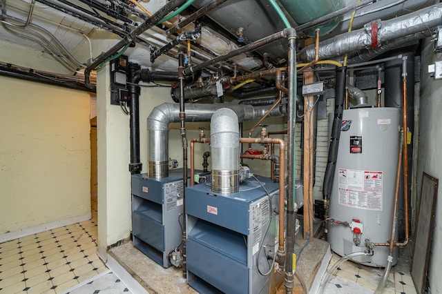 utility room featuring gas water heater