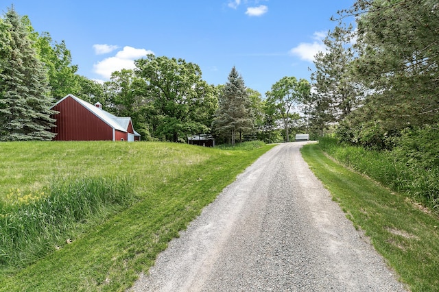 view of street with an outbuilding