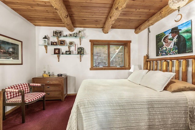 carpeted bedroom featuring beamed ceiling and wooden ceiling