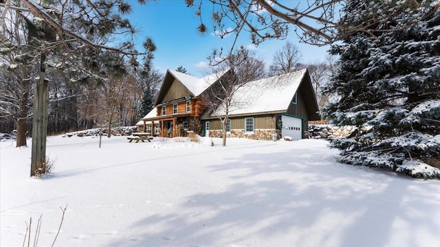 view of snow covered property