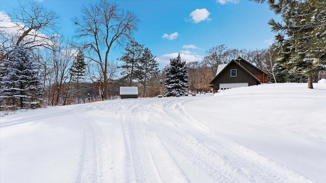 view of yard covered in snow