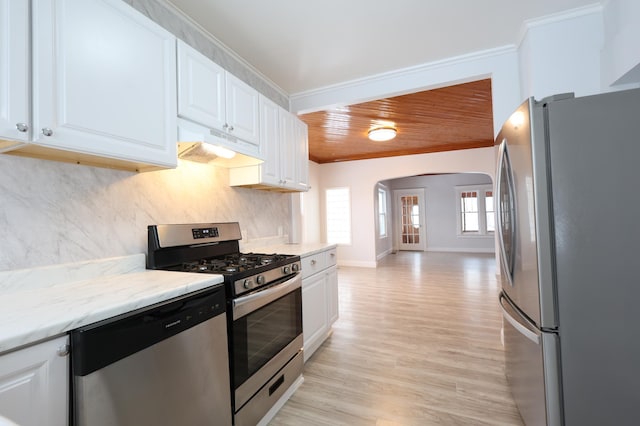 kitchen featuring white cabinetry, ornamental molding, stainless steel appliances, and wooden ceiling