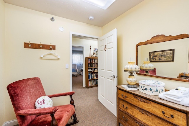 sitting room featuring carpet floors