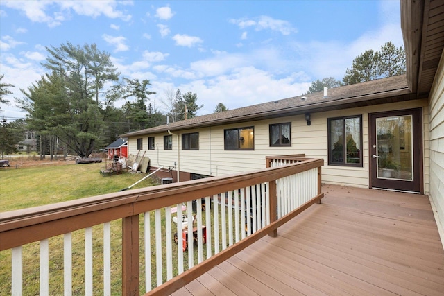 wooden deck with a yard