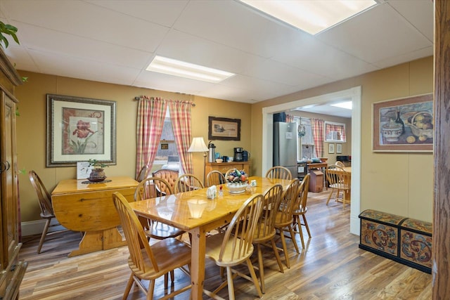 dining area featuring hardwood / wood-style floors