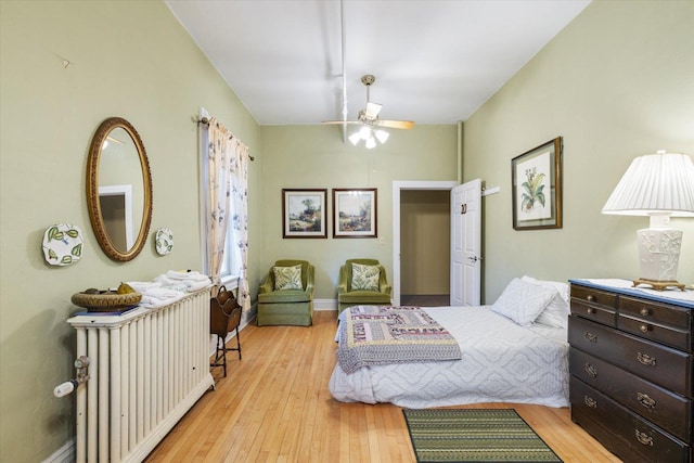 bedroom featuring ceiling fan and light wood-type flooring