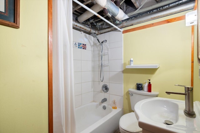 full bathroom with toilet, shower / bathtub combination with curtain, and sink