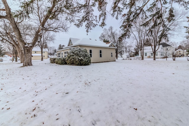 view of snow covered property