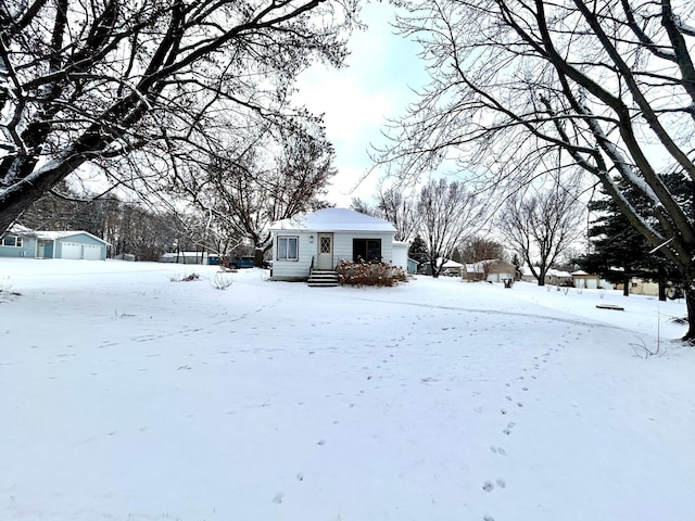 view of yard layered in snow