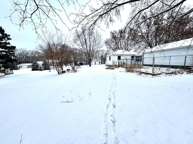 view of yard covered in snow