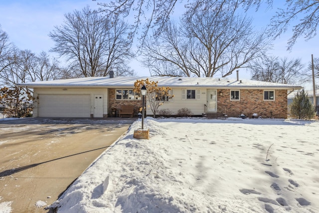 ranch-style house featuring a garage