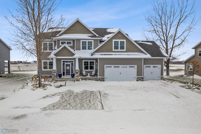 craftsman-style home with a garage