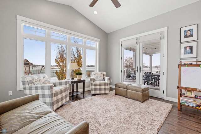 sitting room featuring french doors, dark hardwood / wood-style flooring, vaulted ceiling, and ceiling fan