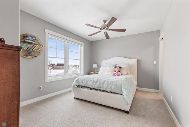 bedroom featuring ceiling fan and light colored carpet