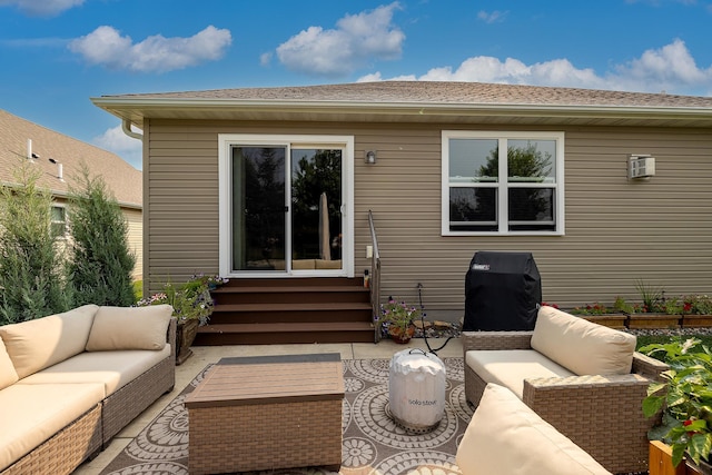 back of house featuring an outdoor hangout area and a patio