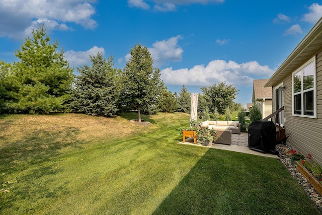 view of yard with an outdoor hangout area and a patio area