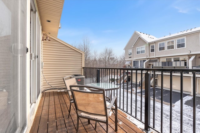 view of snow covered deck