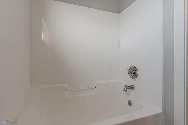 bathroom with shower / bathing tub combination