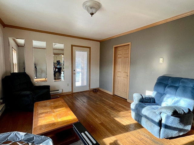 living room featuring hardwood / wood-style floors, ornamental molding, and a baseboard radiator