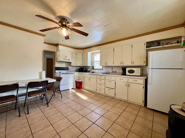 kitchen featuring white appliances, crown molding, ceiling fan, light tile patterned floors, and tasteful backsplash