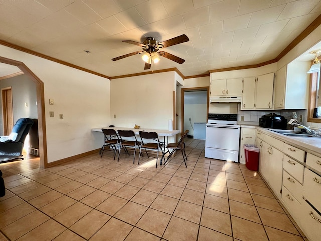 kitchen with tasteful backsplash, ceiling fan, sink, light tile patterned floors, and white range with electric cooktop