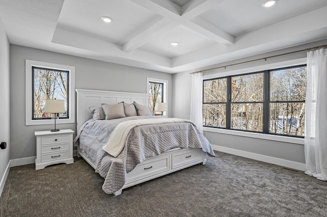 carpeted bedroom with beamed ceiling, multiple windows, and coffered ceiling